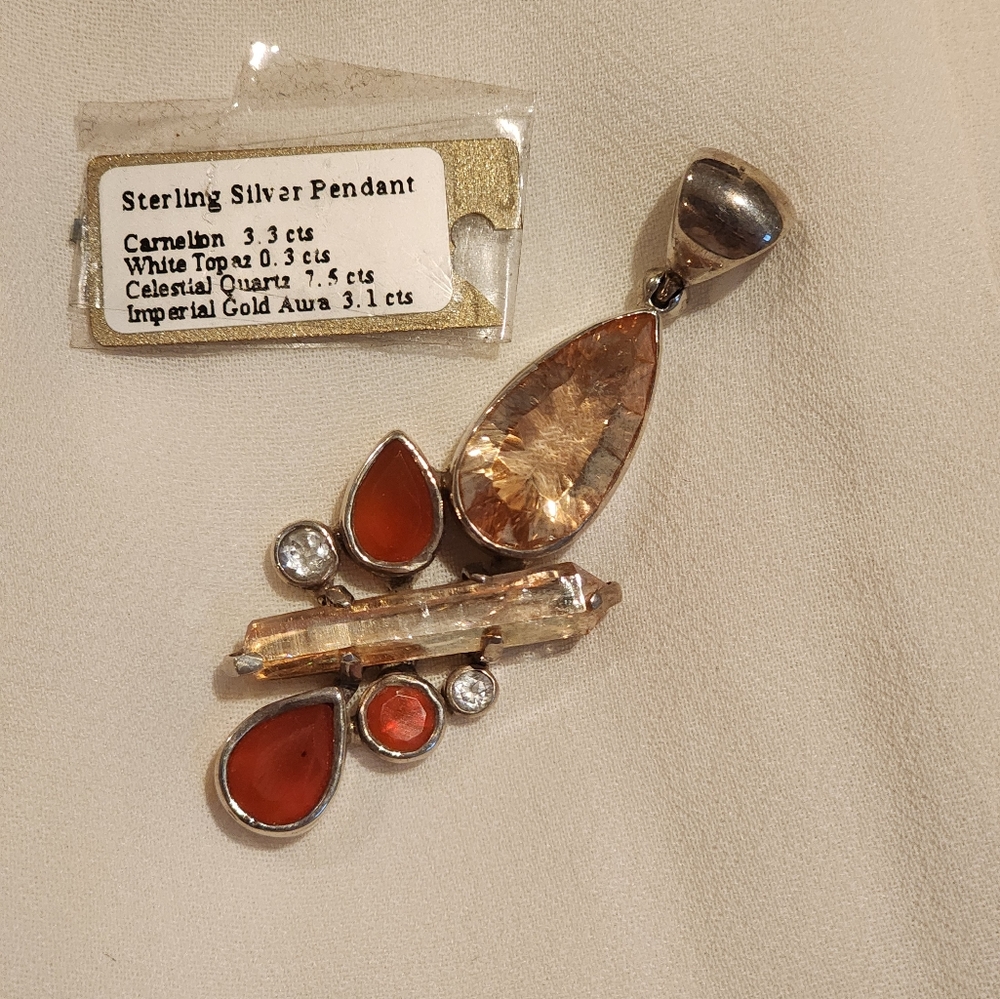Imperial gold aura, carnelian, wht topaz, celestial quartz pendant